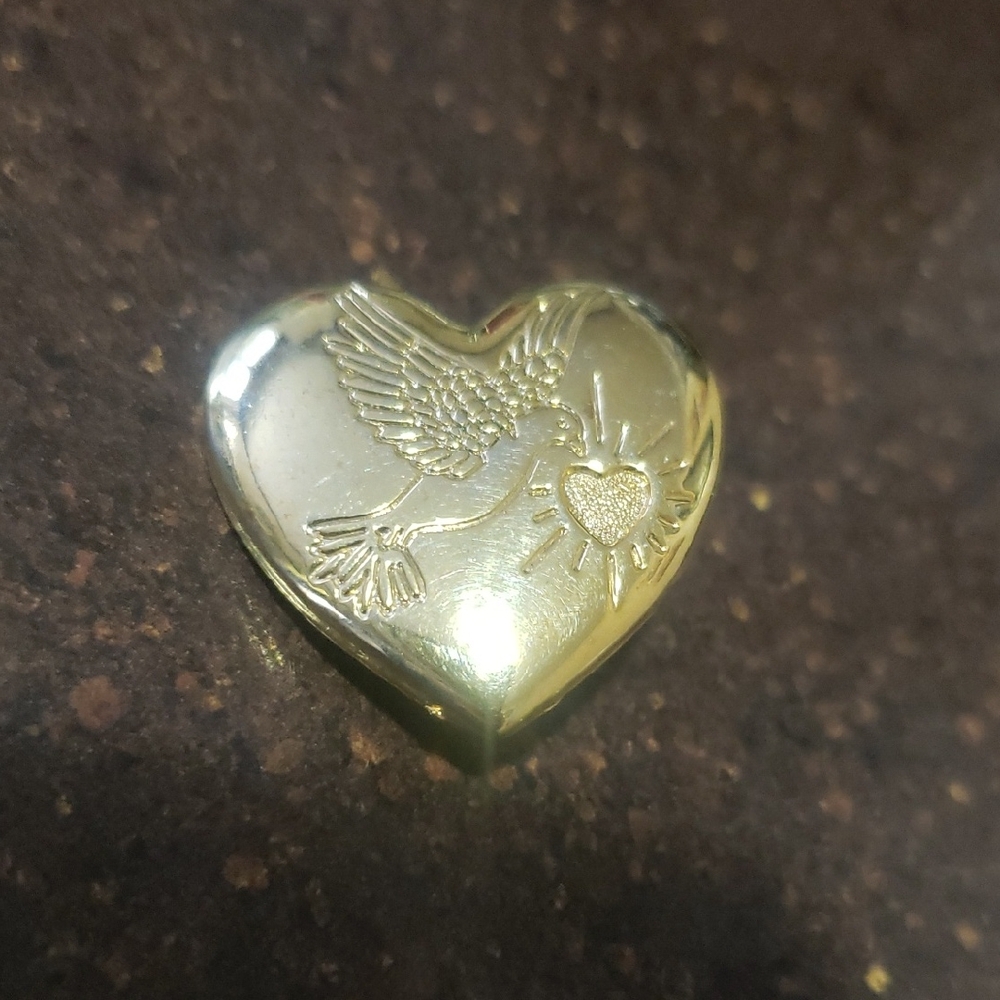 The Variety Club Gold Heart Brooch with Dove and Heart Design.
